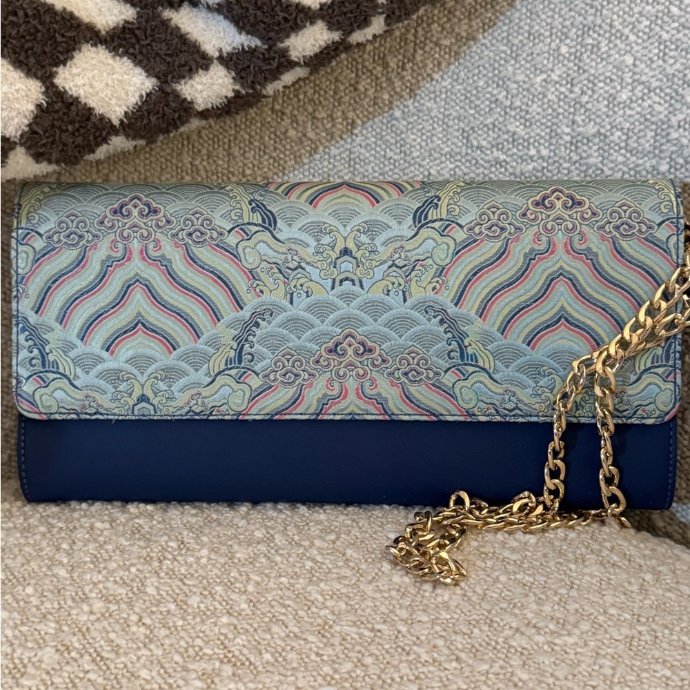 Sophisticated Blue and Gold Clutch with Geometric Pattern and Chain Strap